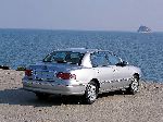 фотография 3 Авто Kia Opirus Седан (1 поколение 2003 2007)